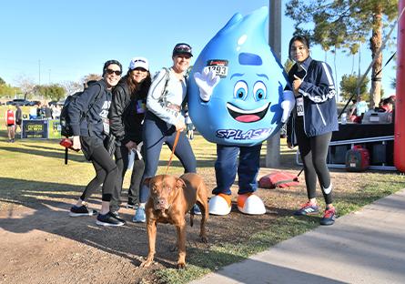 President Kate Smith with Splash, Kate's dog and runners