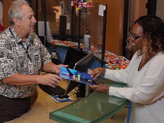 Handing over a book